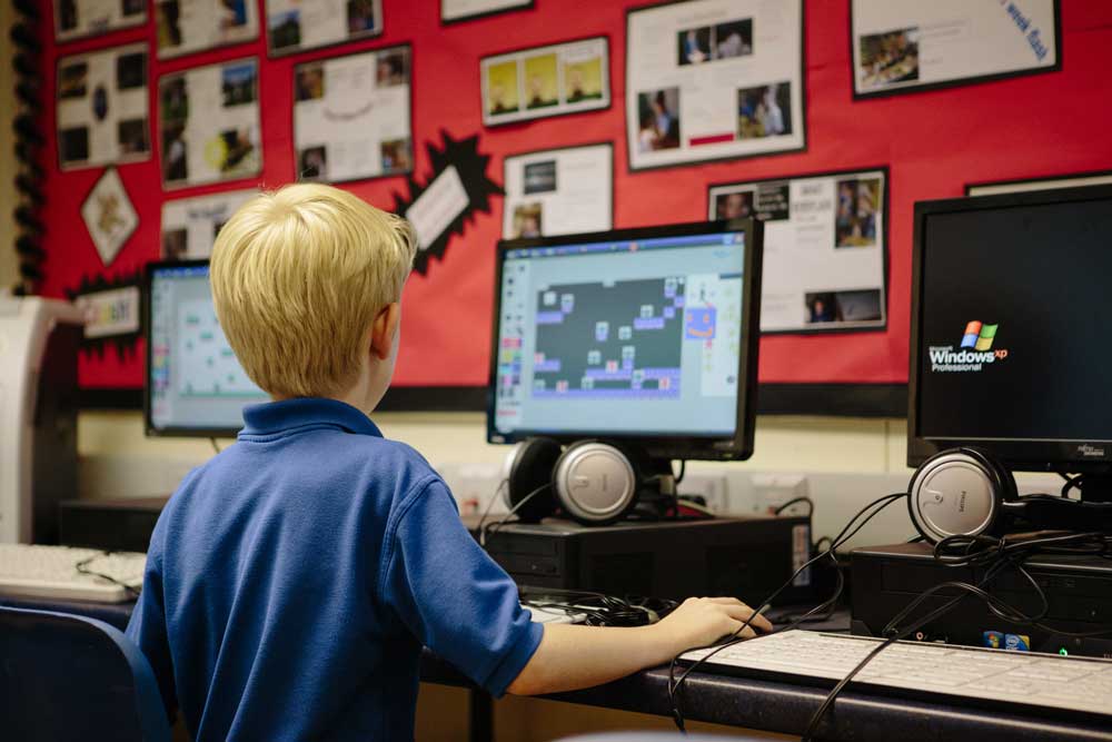 Boy  using a computer